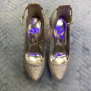 Previously loved silver high heels